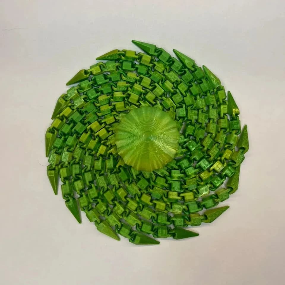 Medusa Sensorial articulada verde impressa em 3D enrolada em espiral